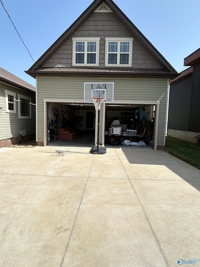 garage featuring driveway