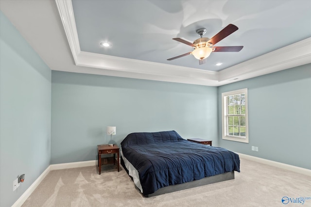 16968 Bellewood Dr, Athens, AL 35613 - carpeted bedroom featuring crown molding, a tray ceiling, and baseboards