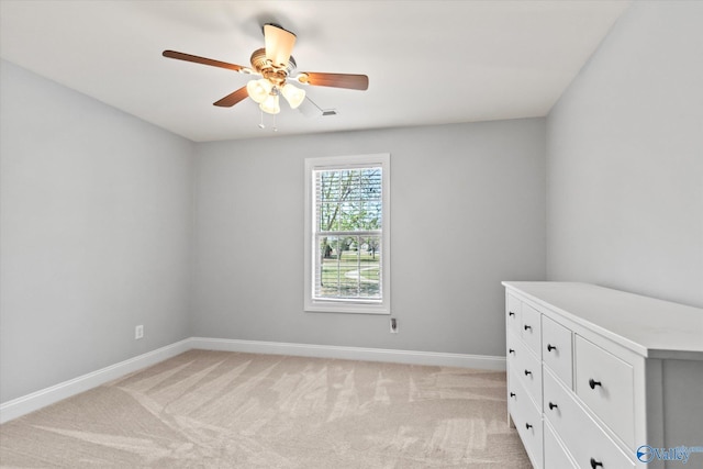 16968 Bellewood Dr, Athens, AL 35613 - spare room featuring baseboards, a ceiling fan, and light colored carpet