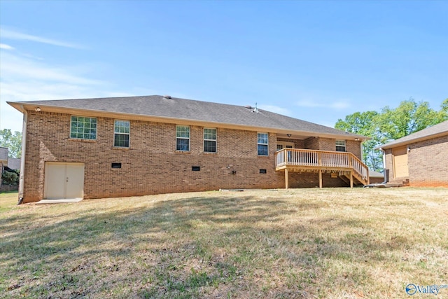 16968 Bellewood Dr, Athens, AL 35613 - back of house with a yard, a wooden deck, and brick siding