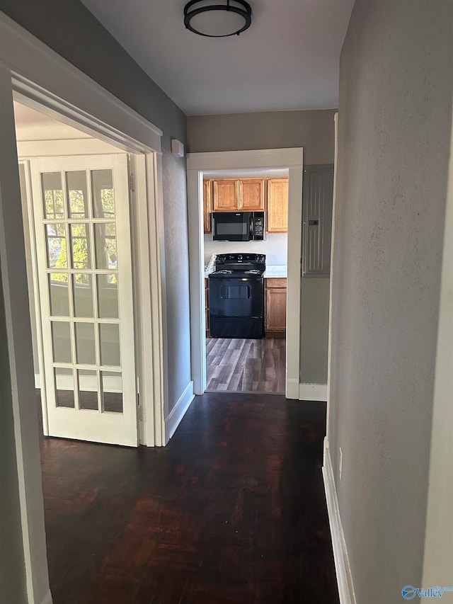 hall featuring dark wood-type flooring