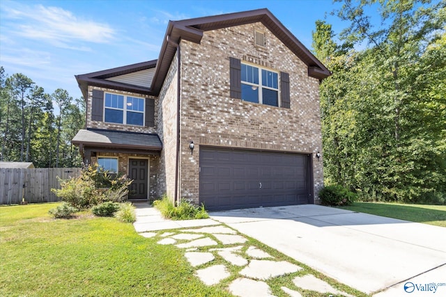 view of property featuring a garage and a front yard