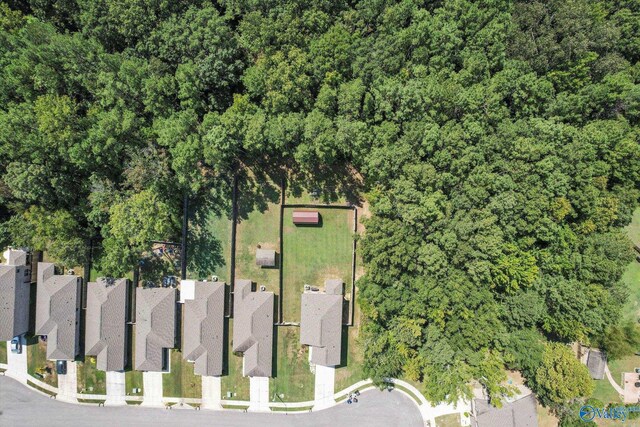 back of property with a patio area, a yard, and central AC