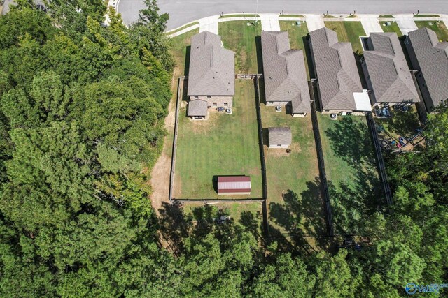 view of front of property with a front yard and a garage