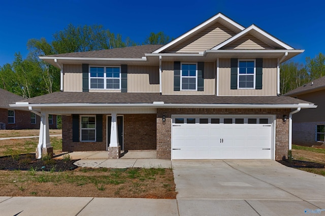 view of front of home with brick siding, a shingled roof, concrete driveway, an attached garage, and board and batten siding