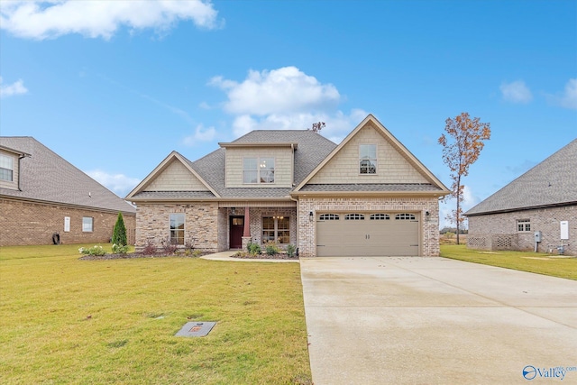 craftsman house featuring a garage and a front lawn