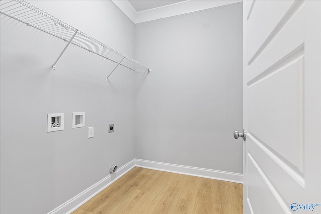 washroom with hookup for an electric dryer, light wood-type flooring, and washer hookup