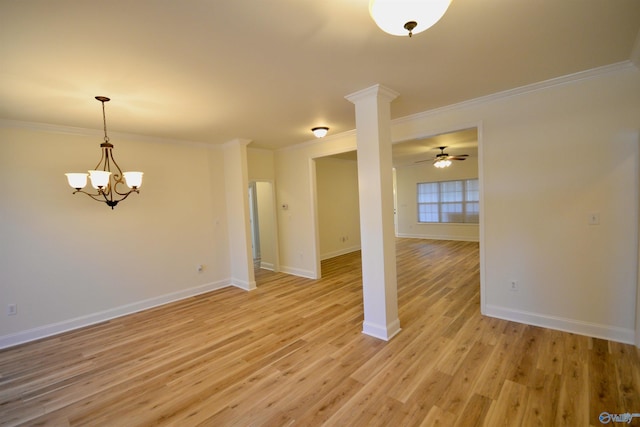 unfurnished room featuring ceiling fan with notable chandelier, light hardwood / wood-style floors, and ornamental molding