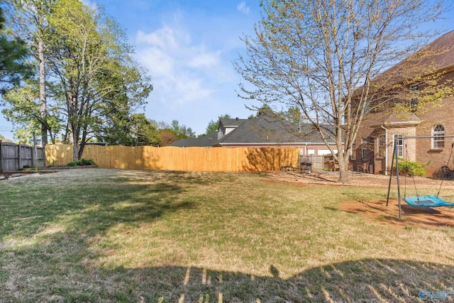 view of yard featuring a fenced backyard
