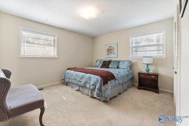 259 Old Big Cove Rd, Brownsboro, AL 35741 - bedroom with carpet floors, multiple windows, and baseboards