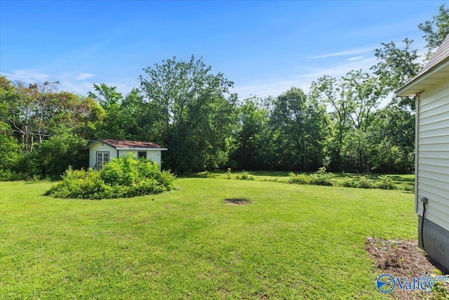 259 Old Big Cove Rd, Brownsboro, AL 35741 - view of green lawn featuring an outdoor structure