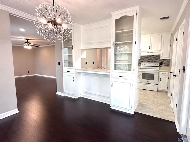 kitchen with white electric range, dark hardwood / wood-style flooring, decorative light fixtures, and white cabinetry