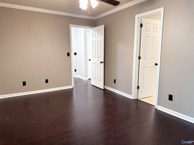 unfurnished room featuring dark hardwood / wood-style flooring, ceiling fan, and crown molding