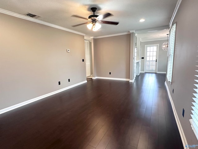 spare room featuring ceiling fan with notable chandelier, a textured ceiling, dark hardwood / wood-style flooring, and crown molding