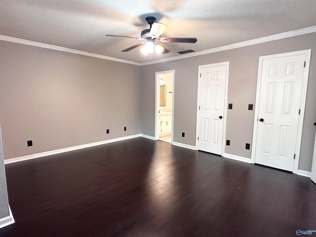 unfurnished room with crown molding, dark hardwood / wood-style flooring, ceiling fan, and a textured ceiling