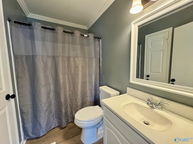 bathroom with vanity, toilet, a shower with curtain, crown molding, and hardwood / wood-style floors