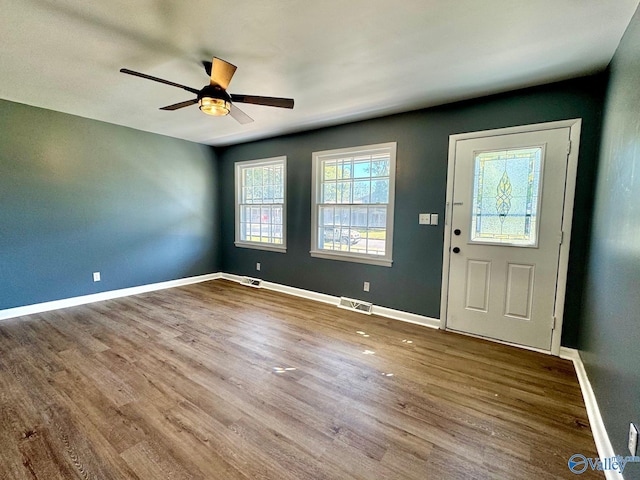 entryway featuring ceiling fan and hardwood / wood-style floors