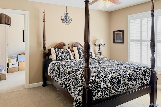 bedroom featuring carpet floors and baseboards