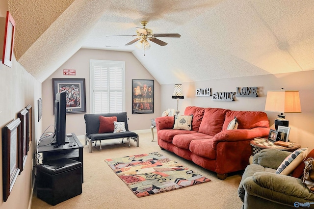 living room featuring ceiling fan, a textured ceiling, vaulted ceiling, and carpet flooring