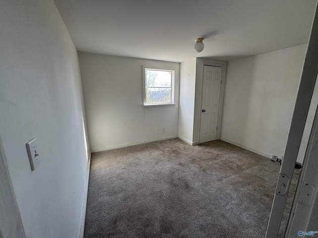 87 Flattop Cir, Scottsboro, AL 35768 - unfurnished bedroom featuring baseboards and carpet flooring