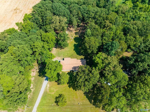 drone / aerial view with a view of trees