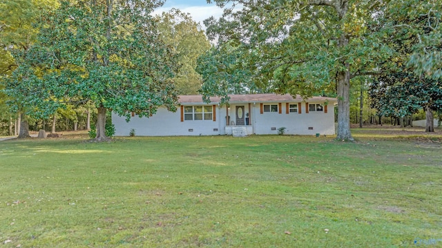 ranch-style house with crawl space and a front yard