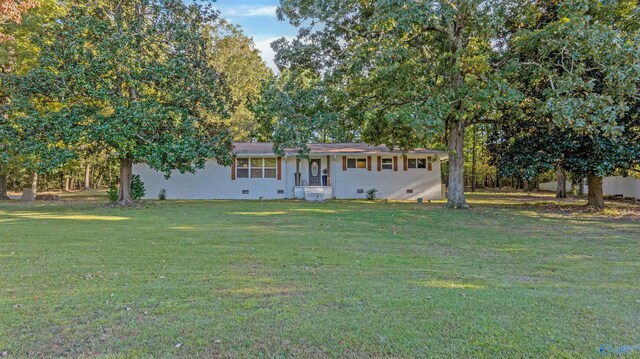 ranch-style home featuring crawl space and a front yard