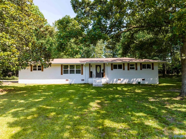 single story home with crawl space, a front lawn, and brick siding
