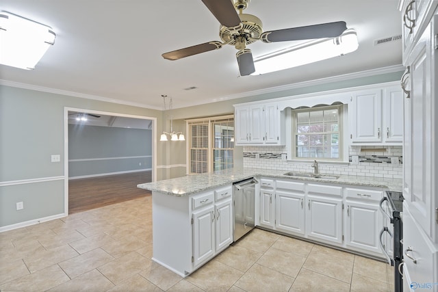 2303 Chatam Ave, Decatur, AL 35603 - kitchen with appliances with stainless steel finishes, a peninsula, a ceiling fan, crown molding, and tasteful backsplash