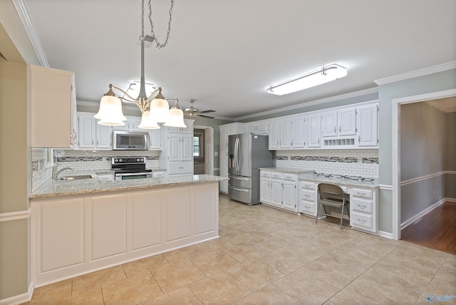 2303 Chatam Ave, Decatur, AL 35603 - kitchen featuring appliances with stainless steel finishes, backsplash, a sink, a peninsula, and ornamental molding