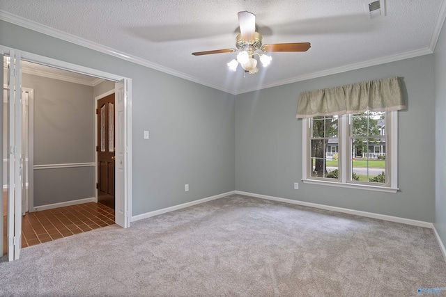 2303 Chatam Ave, Decatur, AL 35603 - carpeted spare room with ceiling fan, baseboards, ornamental molding, and a textured ceiling