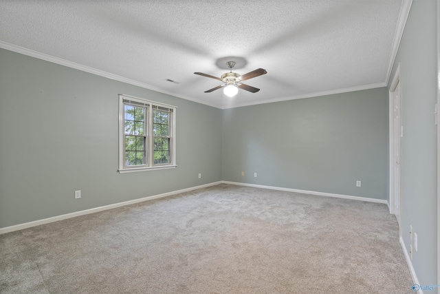 2303 Chatam Ave, Decatur, AL 35603 - unfurnished room with carpet flooring, ceiling fan, a textured ceiling, ornamental molding, and baseboards