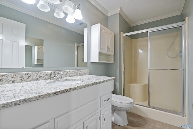 2303 Chatam Ave, Decatur, AL 35603 - bathroom with a stall shower, vanity, toilet, crown molding, and tile patterned flooring