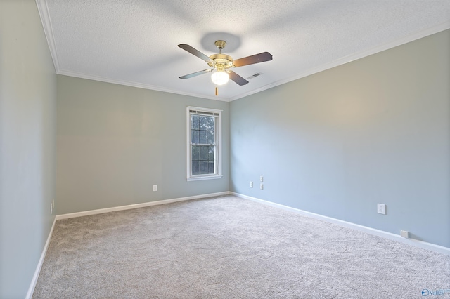 2303 Chatam Ave, Decatur, AL 35603 - unfurnished room featuring carpet, a textured ceiling, a ceiling fan, crown molding, and baseboards
