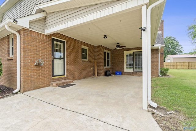 2303 Chatam Ave, Decatur, AL 35603 - view of patio with an attached carport, a ceiling fan, and entry steps