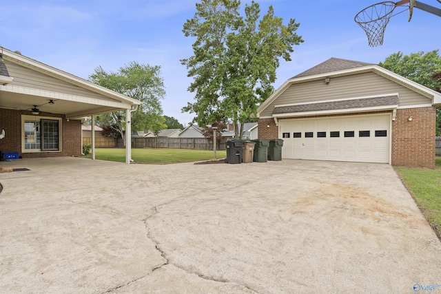 2303 Chatam Ave, Decatur, AL 35603 - view of property exterior with brick siding, driveway, and ceiling fan