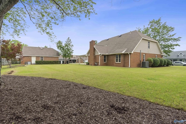 2303 Chatam Ave, Decatur, AL 35603 - view of grassy yard with central air condition unit
