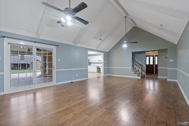 2303 Chatam Ave, Decatur, AL 35603 - unfurnished living room featuring a ceiling fan, plenty of natural light, hardwood / wood-style flooring, and baseboards