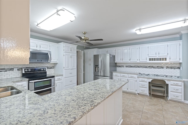 2303 Chatam Ave, Decatur, AL 35603 - kitchen with appliances with stainless steel finishes, ornamental molding, decorative backsplash, ceiling fan, and light stone countertops