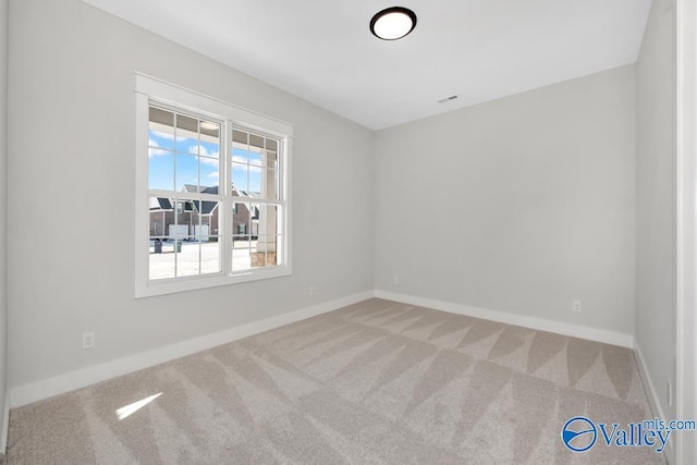 empty room with carpet floors