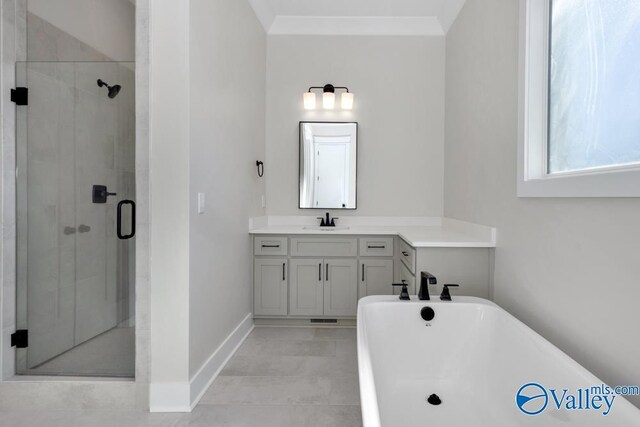 bathroom featuring shower with separate bathtub, ornamental molding, and vanity