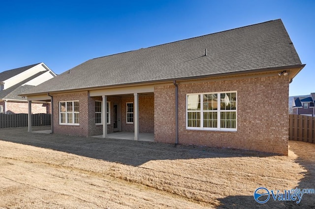 back of property featuring a patio