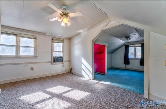 additional living space with carpet flooring, vaulted ceiling, and ceiling fan