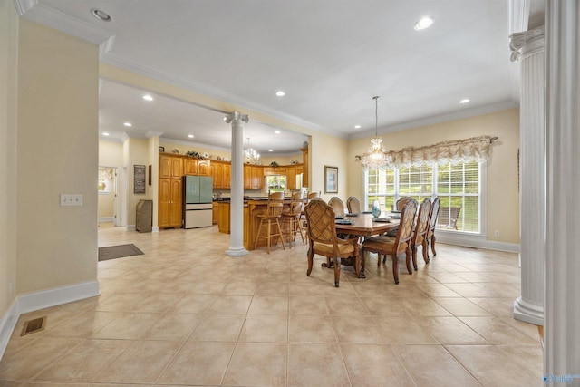 dining area featuring ornamental molding, visible vents, ornate columns, and light tile patterned floors