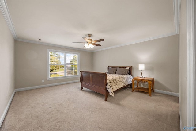 bedroom featuring a ceiling fan, baseboards, crown molding, and light colored carpet