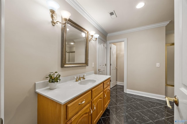 bathroom featuring visible vents, crown molding, vanity, and baseboards