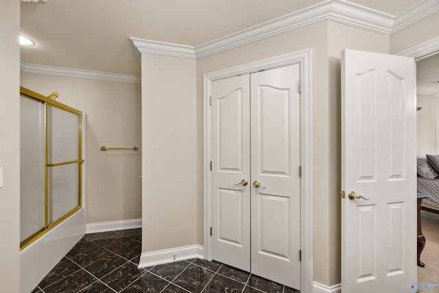 bathroom with marble finish floor, enclosed tub / shower combo, baseboards, and crown molding