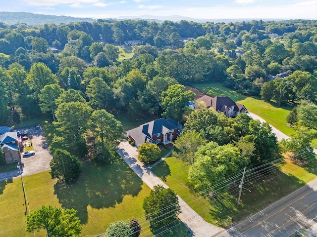 aerial view featuring a view of trees