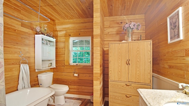 bathroom with wooden ceiling, wooden walls, a bath, and toilet