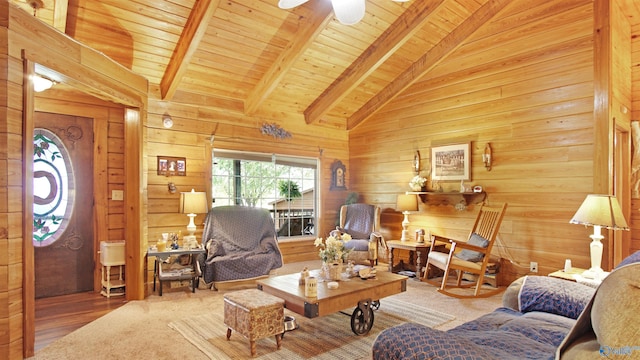 living room with wood walls, wood-type flooring, beamed ceiling, and wood ceiling